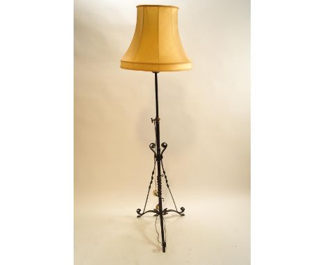 A wrought metal standard lamp, circa 1900, 138cm high