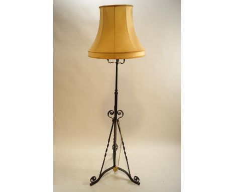A wrought metal standard lamp, circa 1900, 143cm high