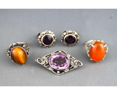 A collection of Bernard Instone Jewellery to include a stamped silver tigers eye ring size: K ½ ; An agate ring size L; stamp