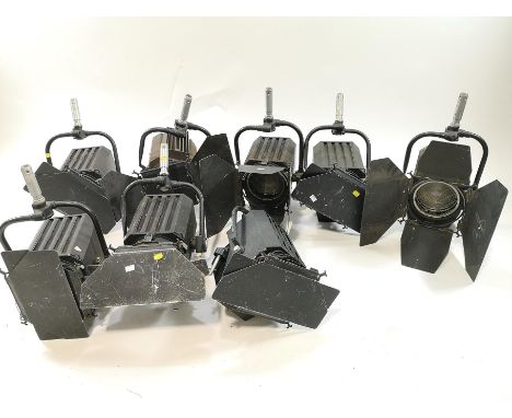 Eight lighting rig lights, mainly Polaris mod 261, one with BBC stickers