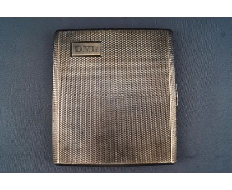 A silver cigarette case, of squared Art Deco form, the surface covered with engine turning, by Walker &amp; Hall, Sheffield 1