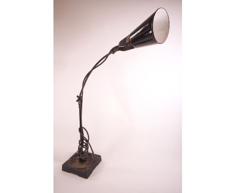 An adjustable desk lamp by Waligraph, with black and white enamel shape, 80cm high