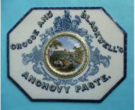 A rare octagonal plaque advertising Crosse and Blackwell’s Anchovy Paste centred by a moulded medallion: Windsor Park, Return