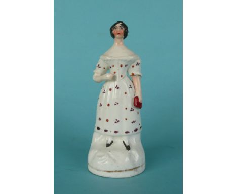 A Staffordshire porcelaineous figure possibly depicting Fanny Kemble, circa 1840, 140mm* In Sir Thomas Lawrence’s portrait of