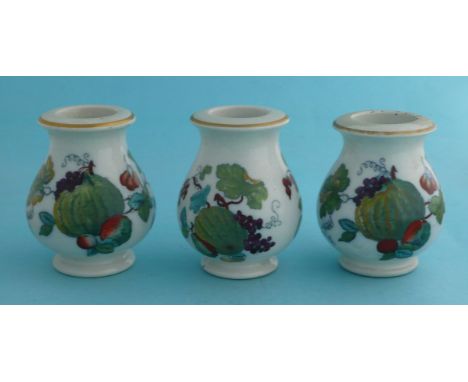 Three small baluster shaped jars with fruits and foliage, one with enamel flaking. One chipped and one restored (3)(potlid po