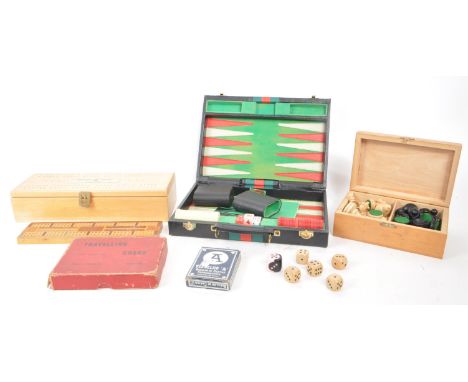 A collection of assorted vintage 20th century board game pieces, comprised of a Korean backgammon briefcase, complete with pi