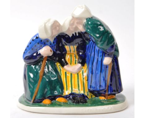 Louis Henri Nicot (1878-1944) - Henriot Quimper pottery figure group, French, early 20th century, depicting 'Les Trois Commer