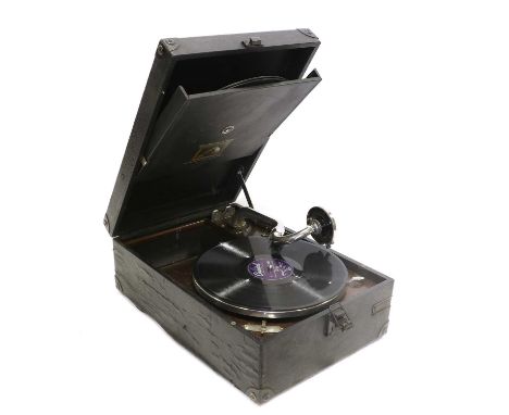 An HMV Model C101J Portable Gramophone with No.4 soundbox, record storage flap to lid with Nipper transfer, polished motor bo