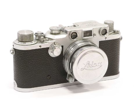 Leica IIIc Camera no.394979, with Leitz Summitar f2 50mm lens, in leather caseCosmetically Excellent to Good with some wear; 