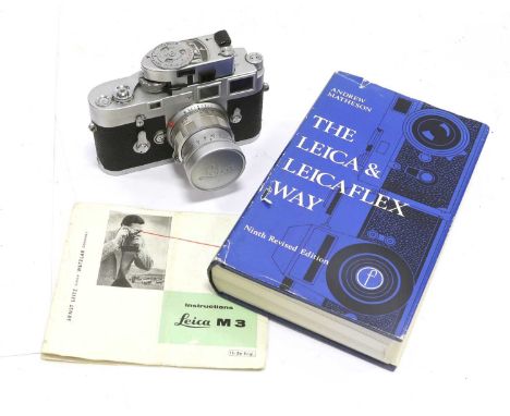 Leica M3 Camera no.1096919 with Leitz Summicron f2 50mm lens, in leather caseCosmetically Excellent; shutter appears to be wo