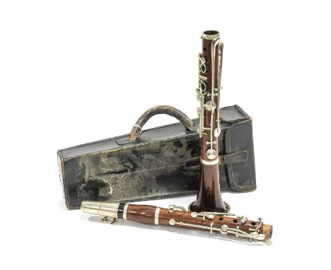 Clarinet By Metzler & Co. (London) all four joints stamped, total length 25 3/4", simple system keywork, possibly cocobolo wo