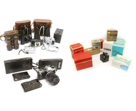 Olympus OM10 Camera with Zuiko f4 35-70mm lens (both with original boxes) Zuiko f1.8 50mm lens; together with four folding ca