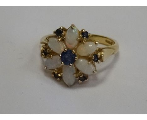 OPAL AND SAPPHIRE CLUSTER DRESS RINGon fourteen carat gold shank, ring size L