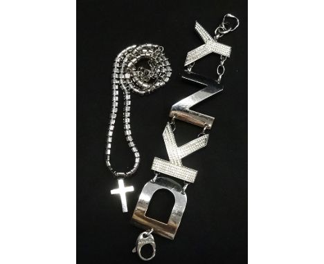 DKNY BRACELETthe K and Y set with multiple rhinestones; together with an Emporio Armani chain with cross pendant (2)