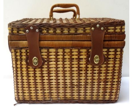 WICKER HAMPER PICNIC SETwith carrying handles and shoulder strap, the interior containing four plates, four cups, cutlery and