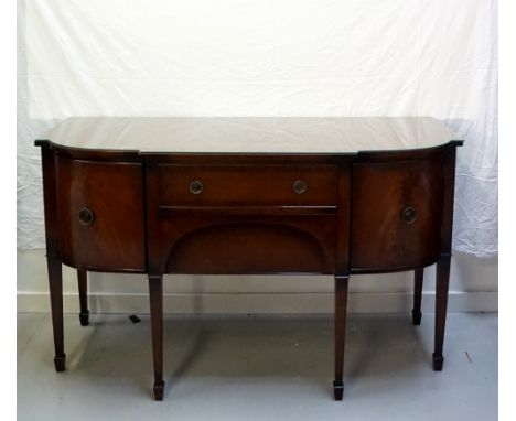EDWARDIAN STYLE MAHOGANY DINING SUITEcomprising a breakfront sideboard, with removable glass top, two central drawers flanked