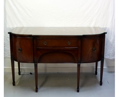 EDWARDIAN STYLE MAHOGANY DINING SUITEcomprising a breakfront sideboard, with removable glass top, two central drawers flanked