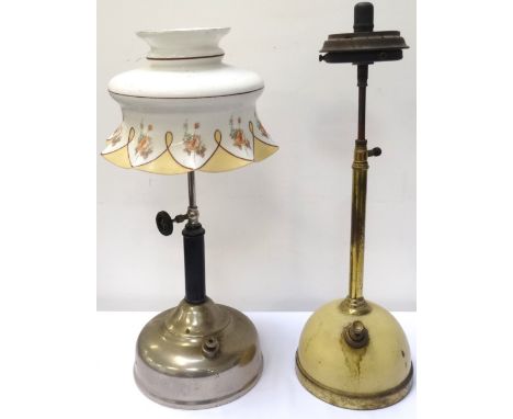 NEW AND UNUSED TILLEY STORM LIGHTmodel X246B, with original box and instructions, 33.5cm high; together with a vintage Tilley