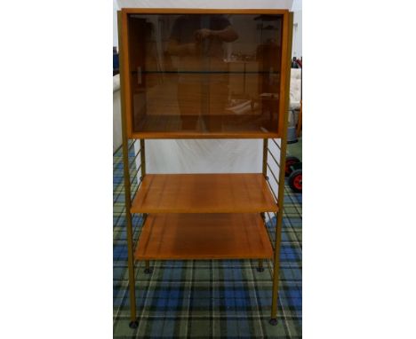RETRO TEAK CABINETwith a pair of glass sliding doors to the upper section with a glass adjustable shelf, above two adjustable