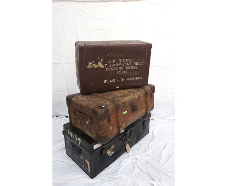 VINTAGE METAL TRAVEL TRUNKwith side carrying handles and stencilled 'Capt. J.K. Binns R.A.M.C.', 90cm wide; a cloth trunk wit