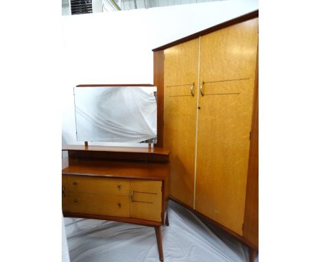 1950s BIRDS EYE MAPLE BEDROOM SUITEcomprising a double bed headboard with built in shelves, 231cm wide, a two door wardrobe w