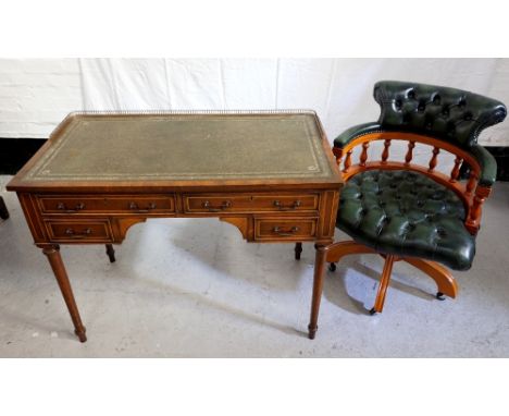 EDWARDIAN STYLE MAHOGANY WRITING DESKwith a brass three quarter gallery around a green tooled inset leather top, above two lo