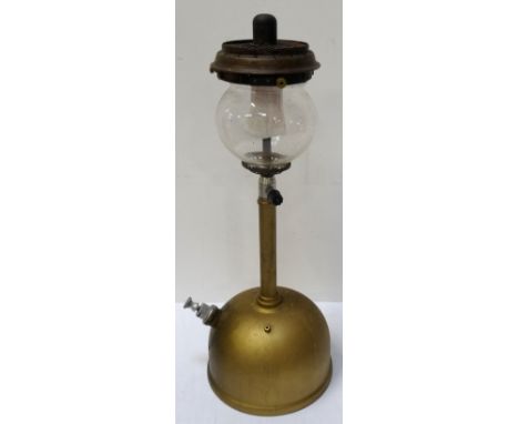 TILLEY LAMPwith a domed reservoir and mantle, model TY20, 45cm high, together with an Aladdin Table Oil Lamp with a red glass