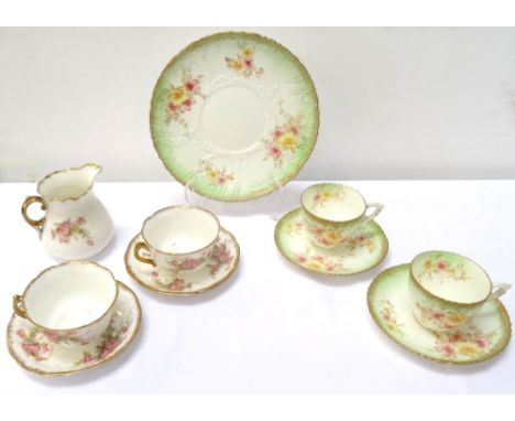 EDWARDIAN 'MOORE' PART CHINA TEA SERVICEwith gilt and floral decoration, comprising eight cups, eleven saucers, six side plat
