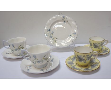WEDGWOOD COFFEE SERVICEthe yellow ground decorated with ivy within a gilt border, comprising six cups and saucers and a milk 