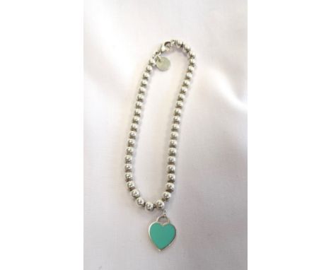 TIFFANY AND CO. RETURN TO TIFFANY SILVER BEAD BRACELETthe silver heart tag with blue enamel finish