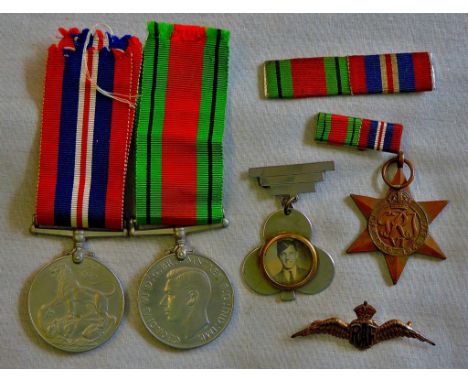 British WWII medals War medal, Defence Medal and The 1939 - 1945 Star, also two sweetheart broaches, one being an RAF wing (B
