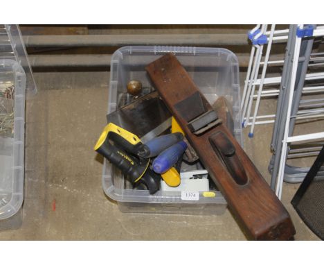 A box of various hand tools to include planes and handsaw