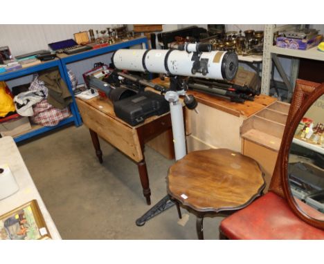 A telescope on tripod stand 