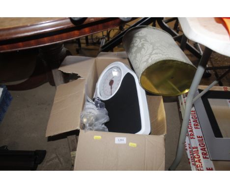 A box containing Salter scales, a waste bin, skipping rope etc.