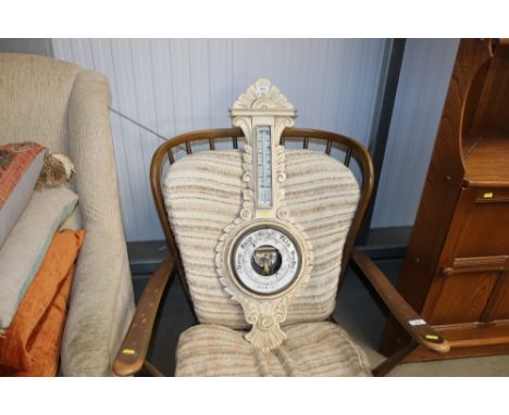 A painted banjo aneroid barometer