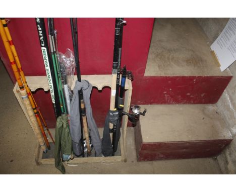 A Shakespeare Strike three piece fishing rod and a telescopic fishing rod and reel