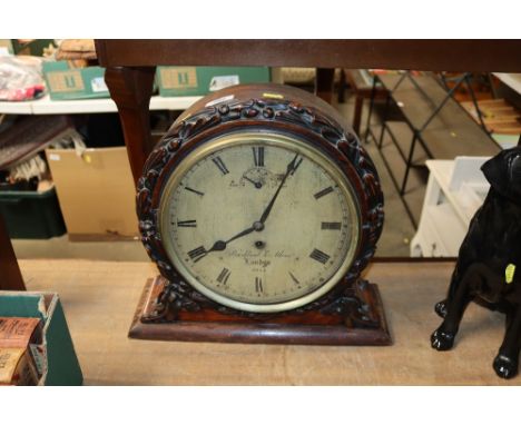 A 19th Century carved mahogany cased mantel clock by Brockbank & Atkins, London No. 2245