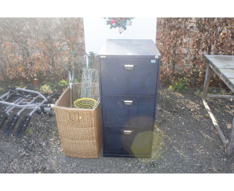A three drawer filing chest; a wicker basket and contents to include shooting stick