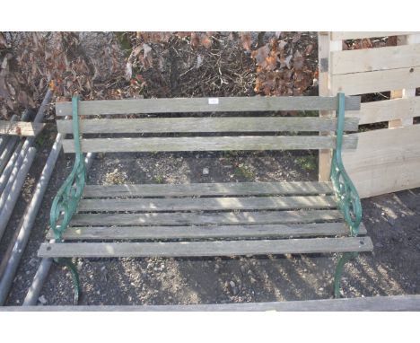 A wooden and metal garden bench 