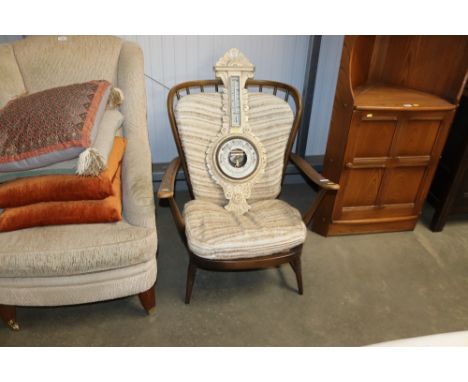An Ercol Cottage style stick back armchair