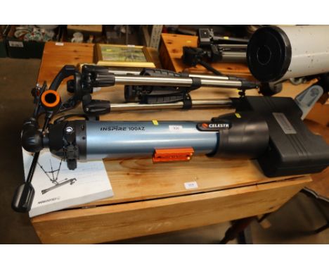 A Celestron telescope with tripod and accessories 
