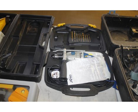 An X-Pro professional hammer drill in case