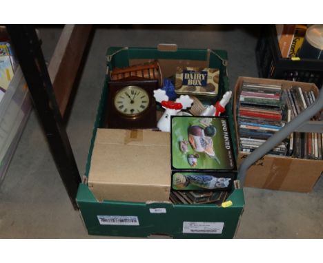 A box containing a mantel clock, various decorative porcelain items etc.