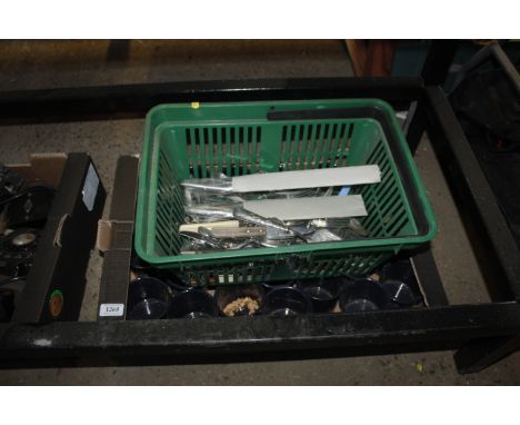 Two boxes containing enamel mugs and cutlery 