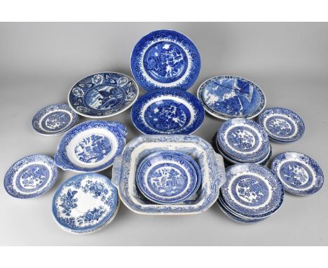 A Collection of Mid 20th Century Blue and White Willow Pattern and Other Plates and Saucers 