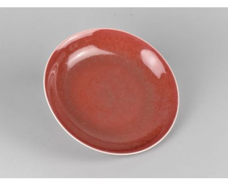 A Chinese Monochrome Dish, Sang De Boeuf Glaze, Qianlong Seal Mark to Base, 22cm Diameter 