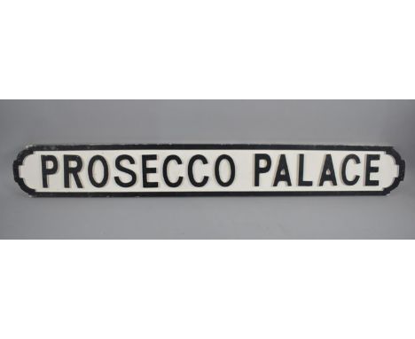 A Modern Wooden Sign in the Form of a Victorian Road Sign, "Prosecco Palace", 105cms Long 