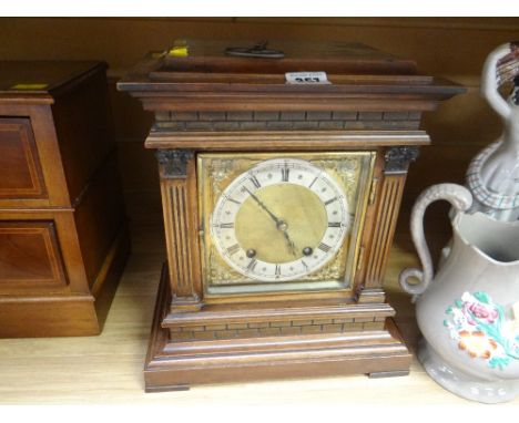 A German mahogany encased architectural mantel clock with brass dial