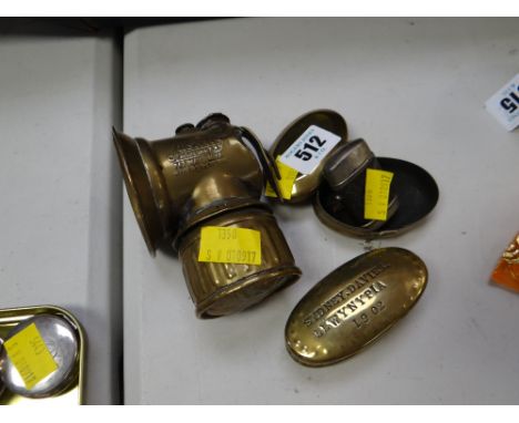 A brass snuff box inscribed Sidney Davies - Llwyn y Pier 1902 together with a Just Right brass cycle lamp etc