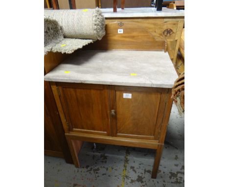 A vintage marble topped compact wash stand with railback